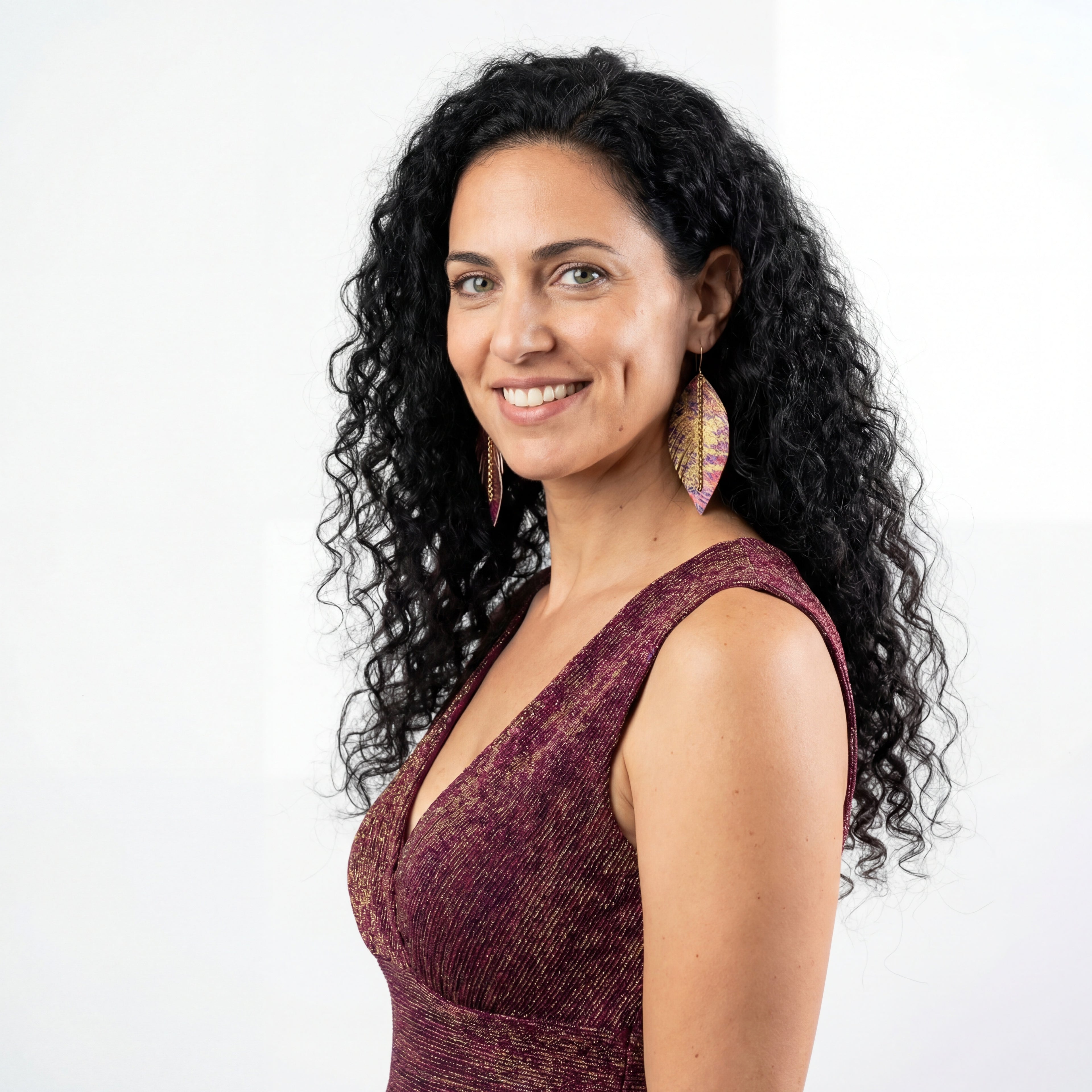 עגילי נוצה מאת שירז פלד