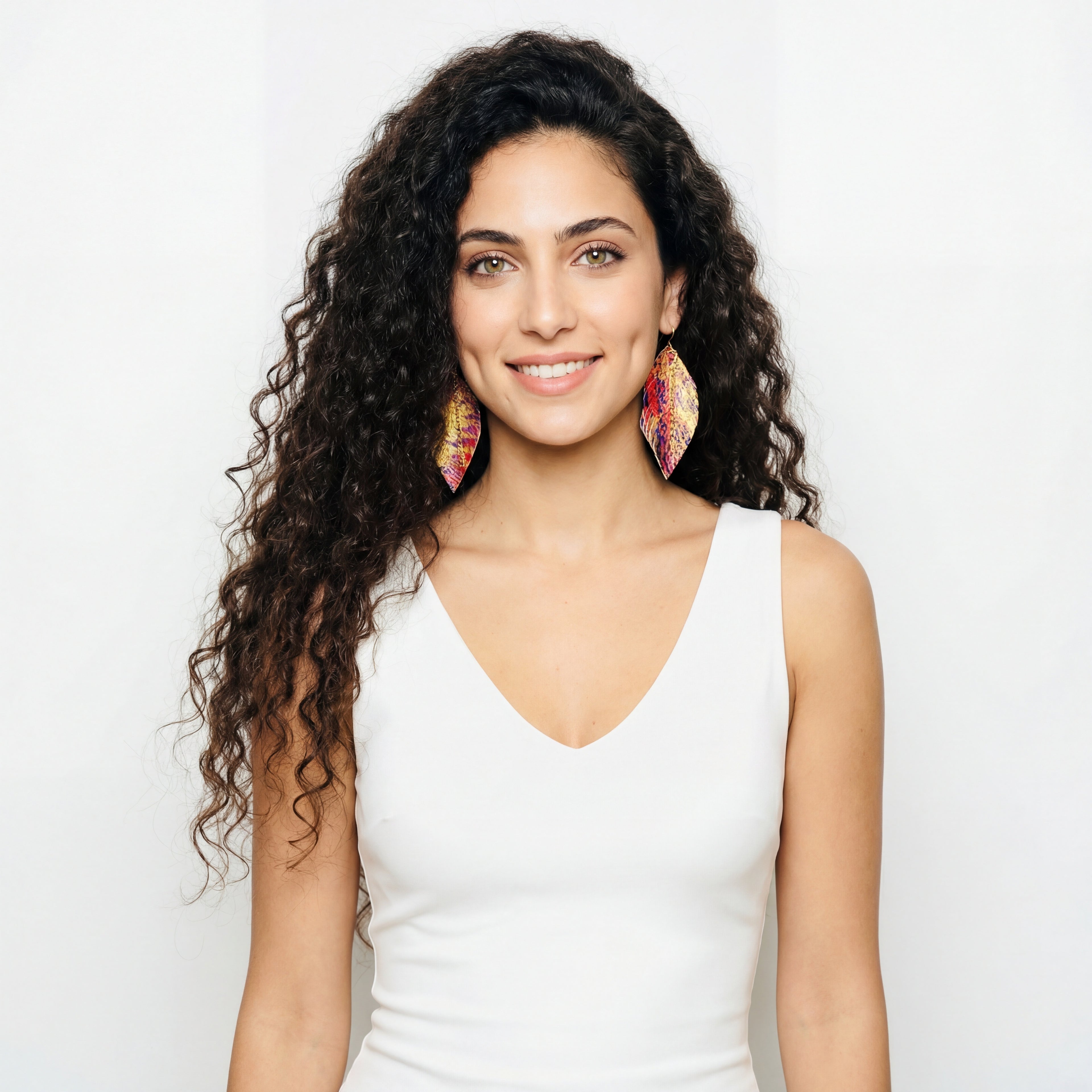 עגילי נוצה מאת שירז פלד