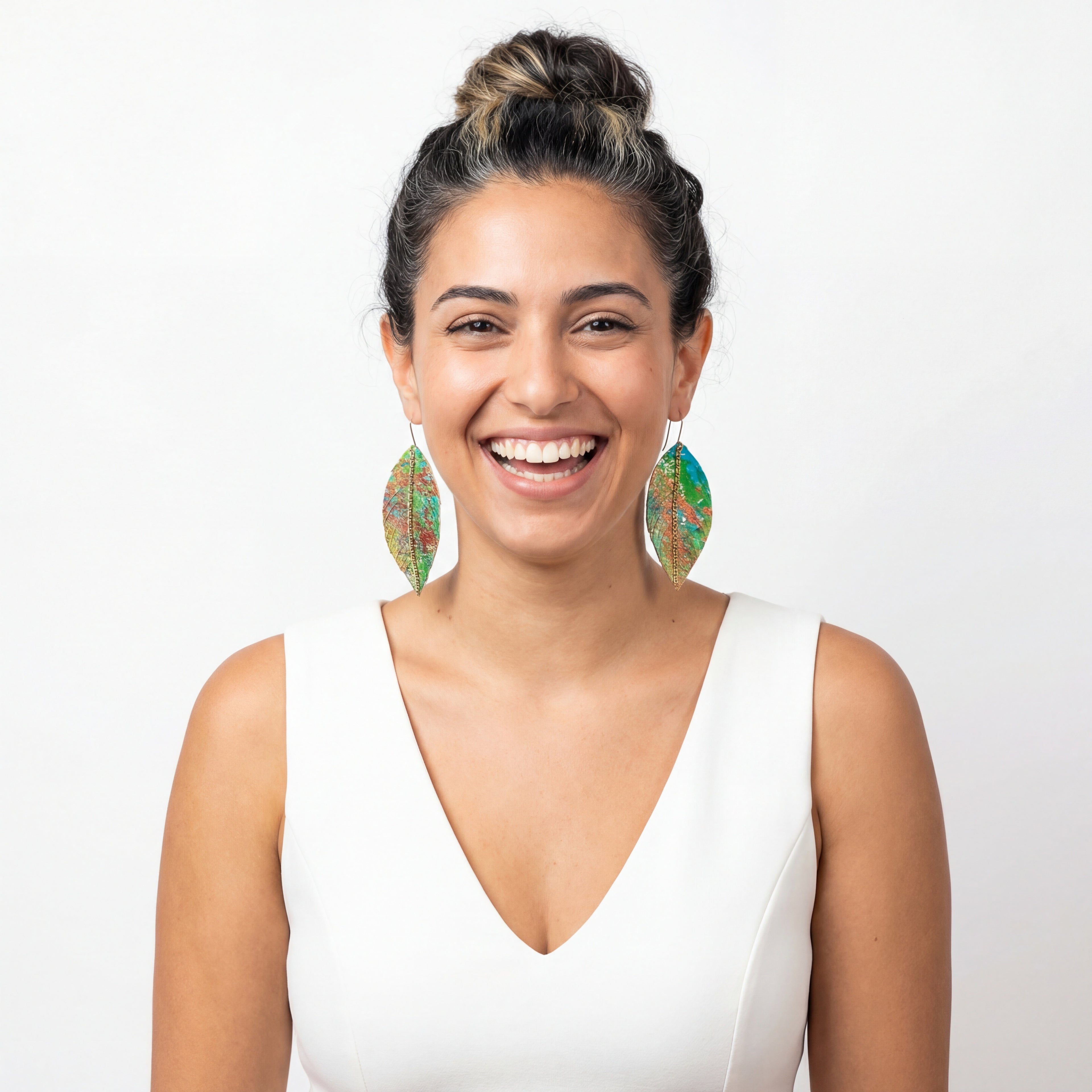 עגילי נוצה מאת שיר פלד