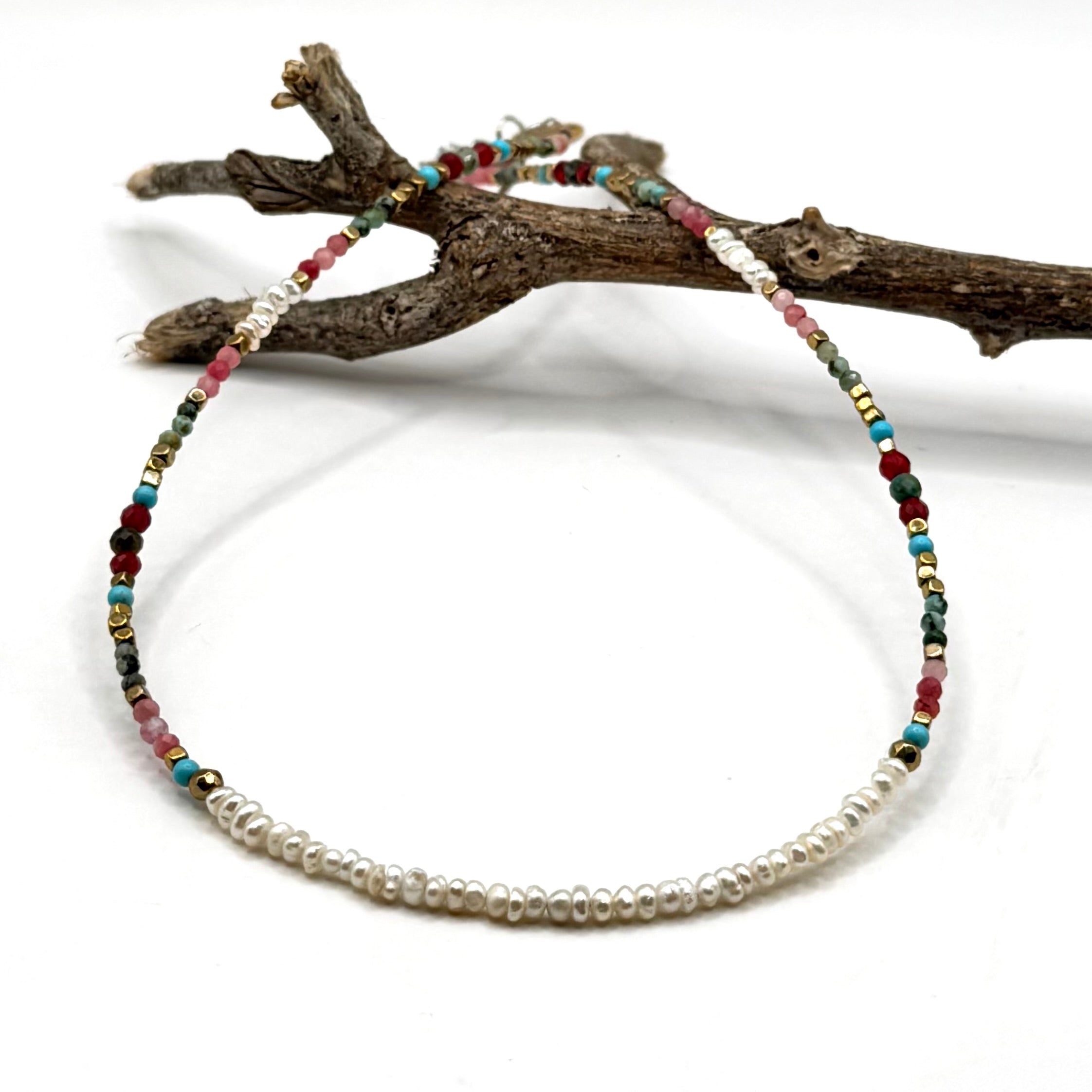 עגיל נוצה מאת שירז פלד