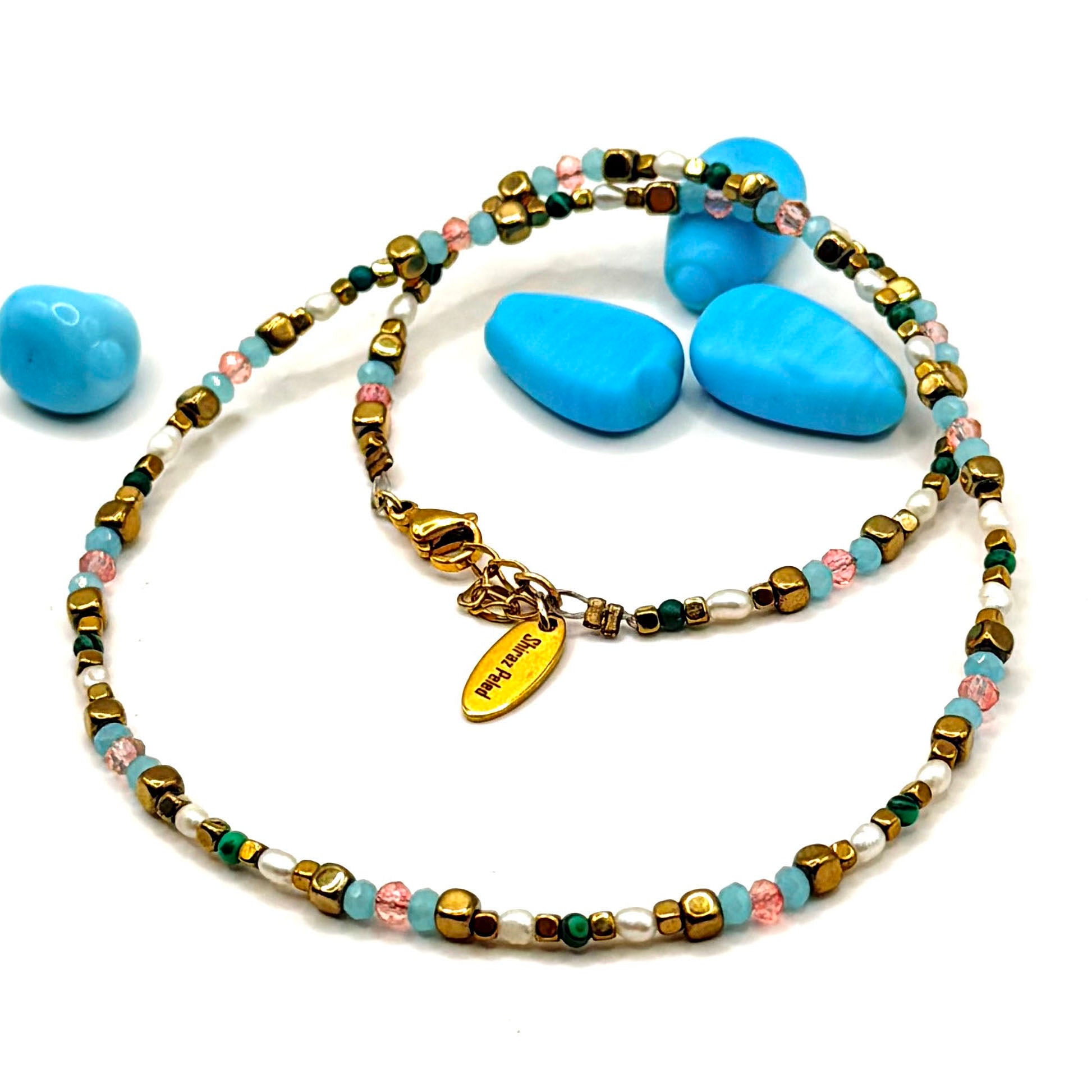 שרשרת פנינים מאת שירז פלד